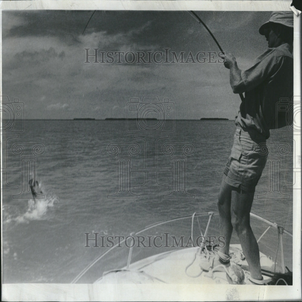 1979 Fisherman Chris Crosby Hooks Fish - Historic Images