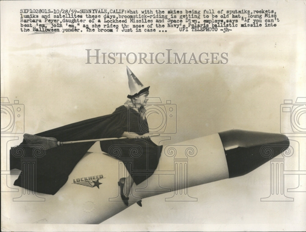 1959 Press Photo Broomstick hat rockets satellites skie - RRV39997 - Historic Images