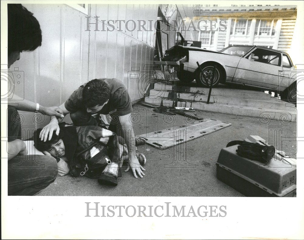 1988 Firefighters child Cyrus McCormick car - Historic Images