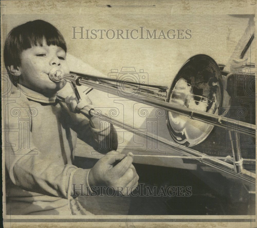 1973 Denny Lewis Trombone Player Red Hot - Historic Images