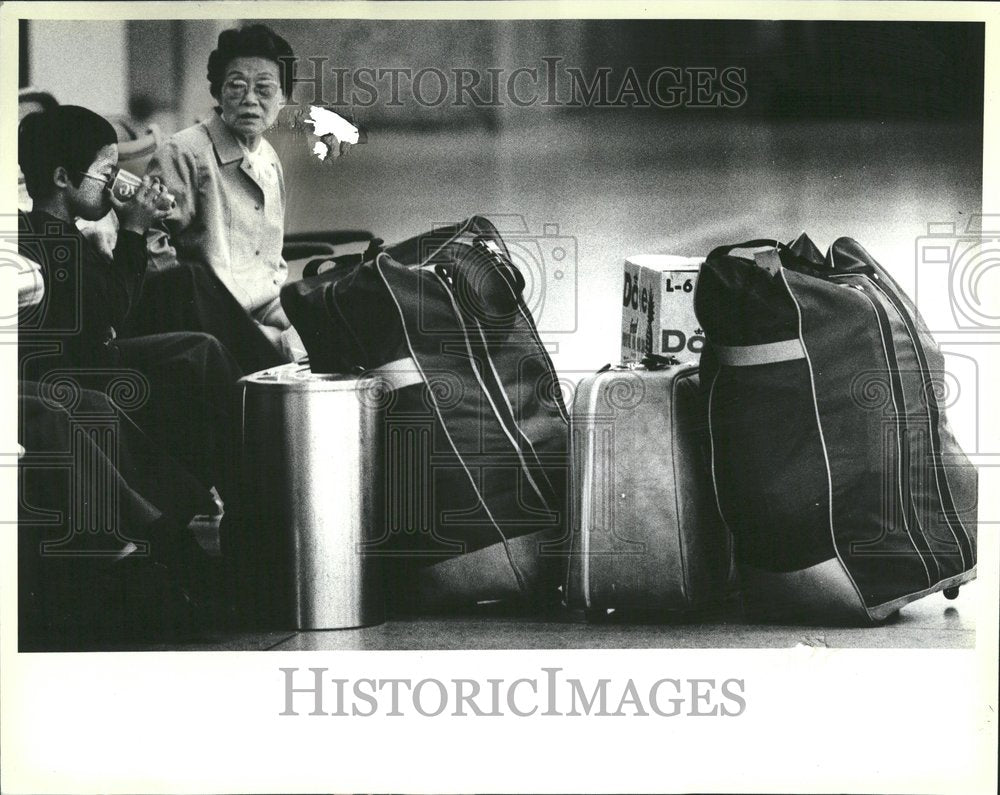 1983 OHare Airport Family Waiting Luggage - Historic Images