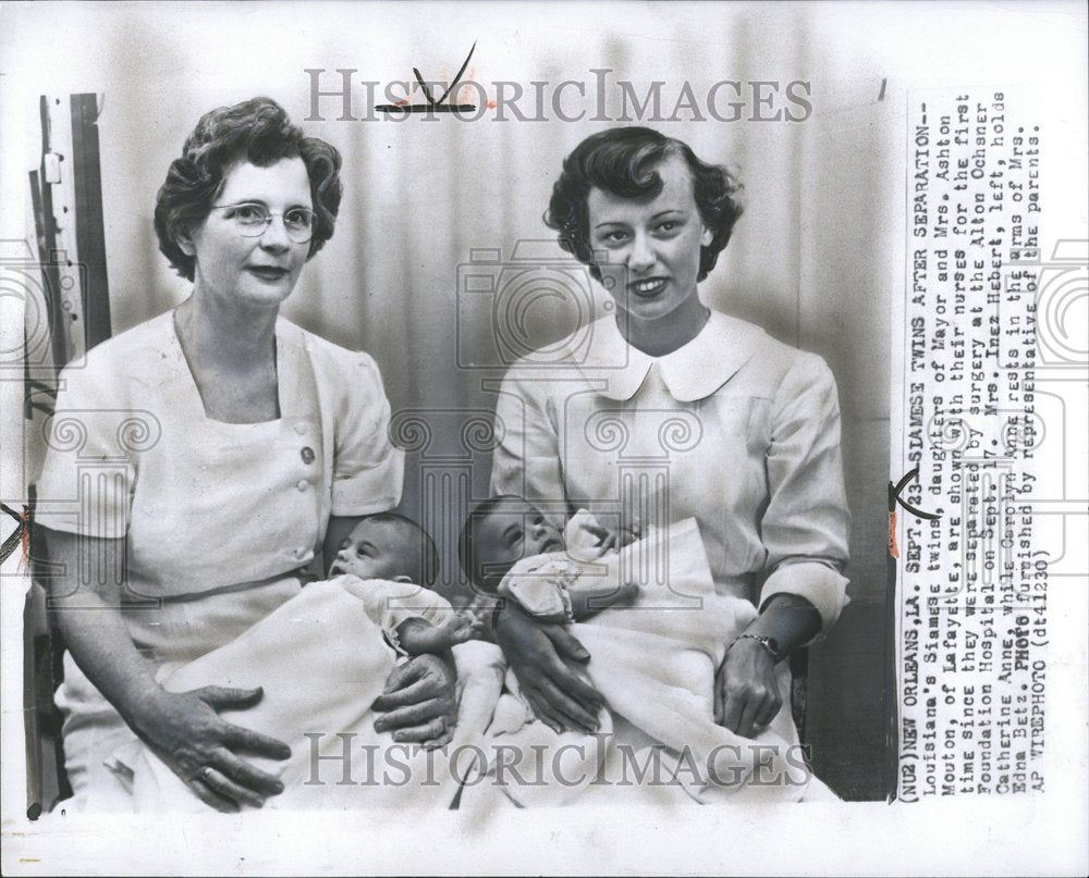 1953 Mrs Ashton Mouton Louisiana Twins Arms - Historic Images