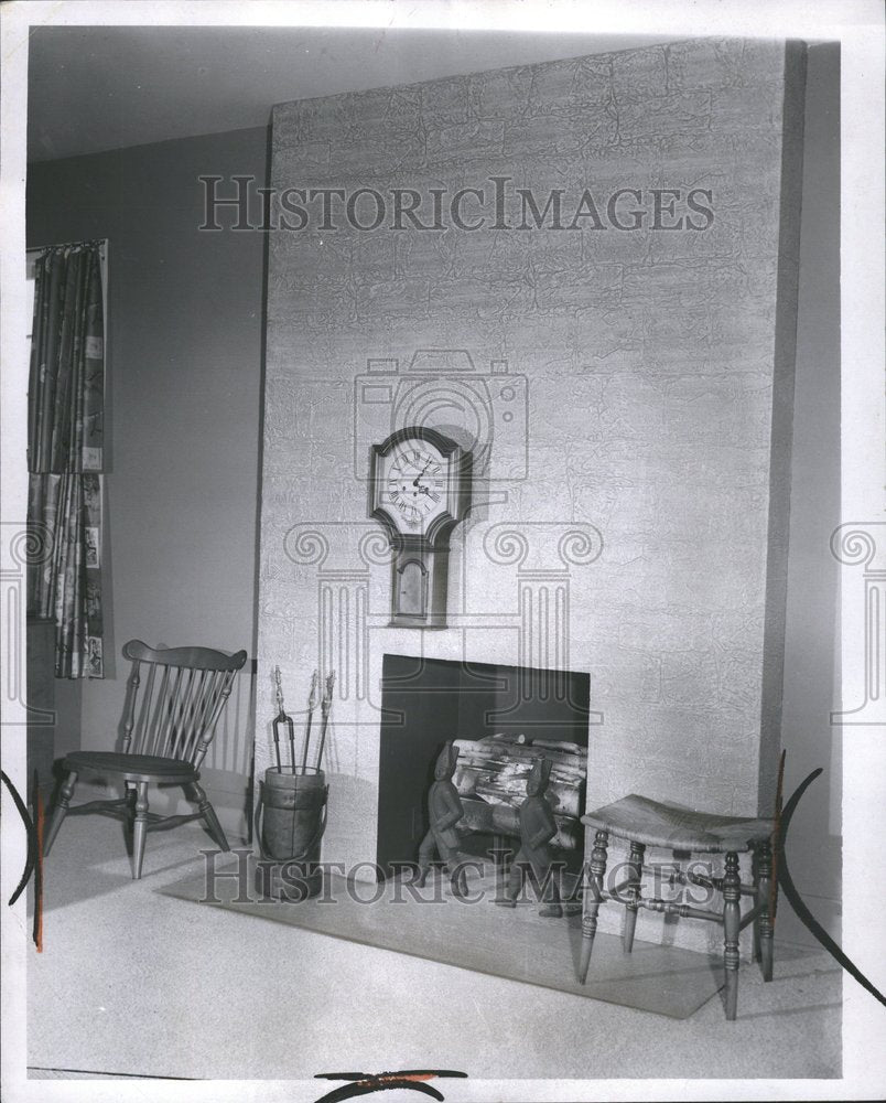 1957 Press Photo House Fireplace Iron Oriental Figures - RRV55637 - Historic Images