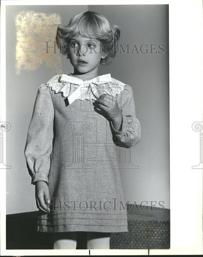 1983 Press Photo Young Girl in Gray Dress - RRV56795 - Historic Images