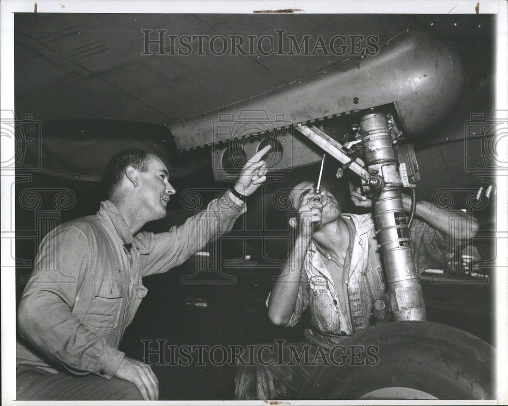 1941, Two Test Pilots Plane Brake Inspection - RRV58349 - Historic Images