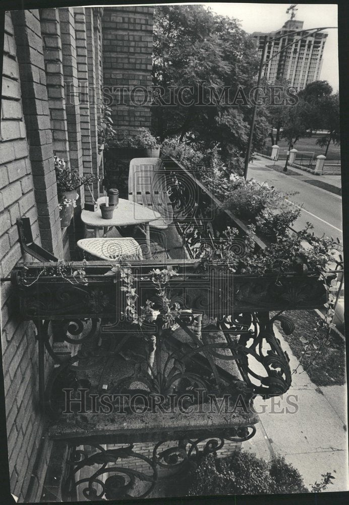 1966 Narrow balcony chair plant space iron - Historic Images