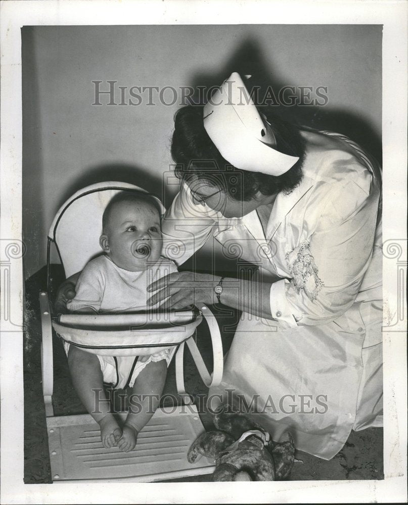 1953 Press Photo MAn Mrs James Nursery Side Happy Baby - RRV61375 - Historic Images