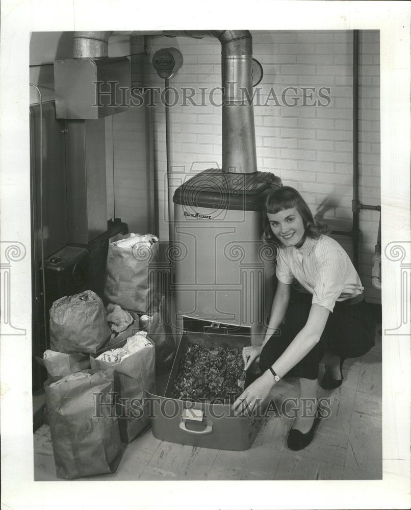 1957 Household Bag rubbish smokeless ash-Historic Images