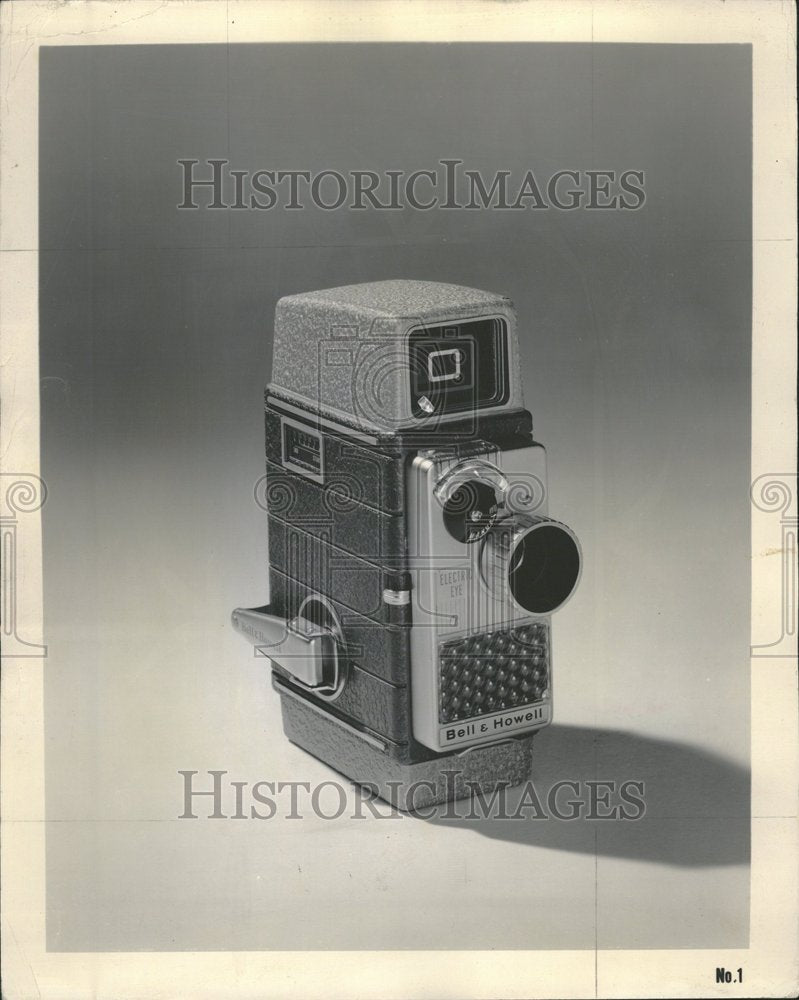 1957 Bell Howell Movie Camera Light Rays - Historic Images