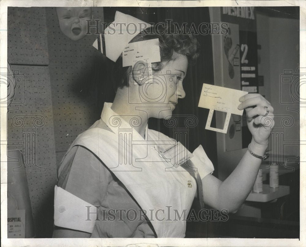 1957 Student nurse Marilyn Donabauer scale - Historic Images