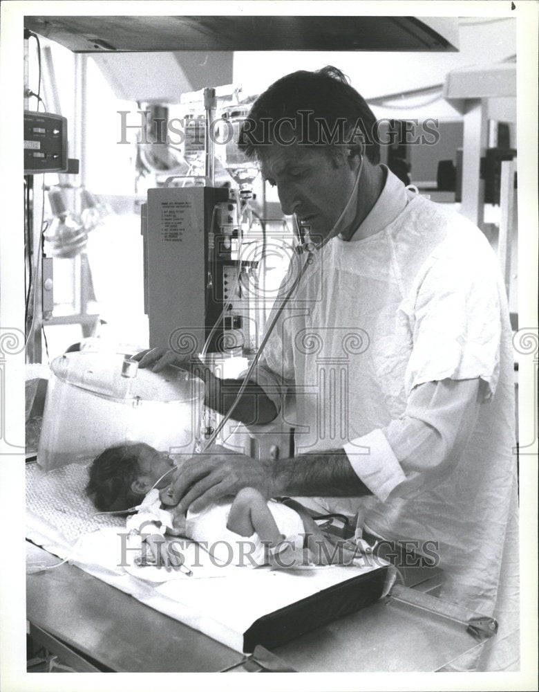 1978 Dr. Judson Randolph checks his patient - Historic Images