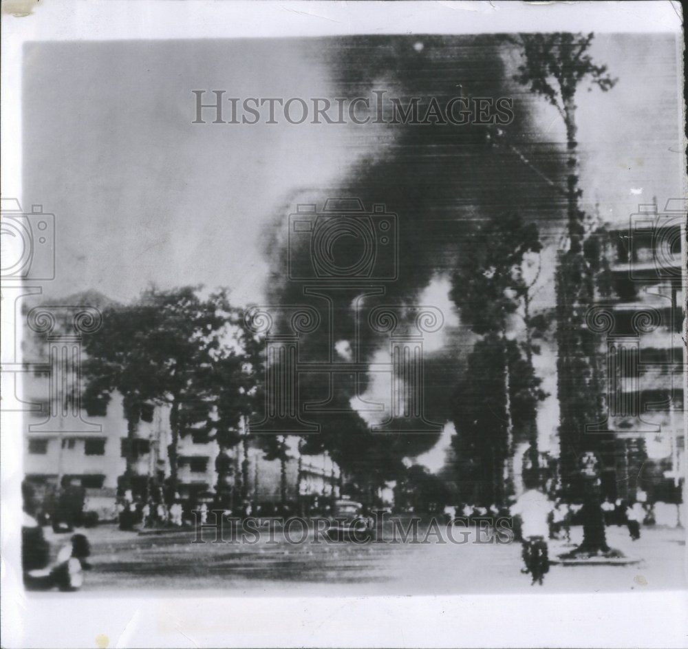 1955 Press Photo Flames War Thousand Grass Hut Smoke - RRV75841 - Historic Images