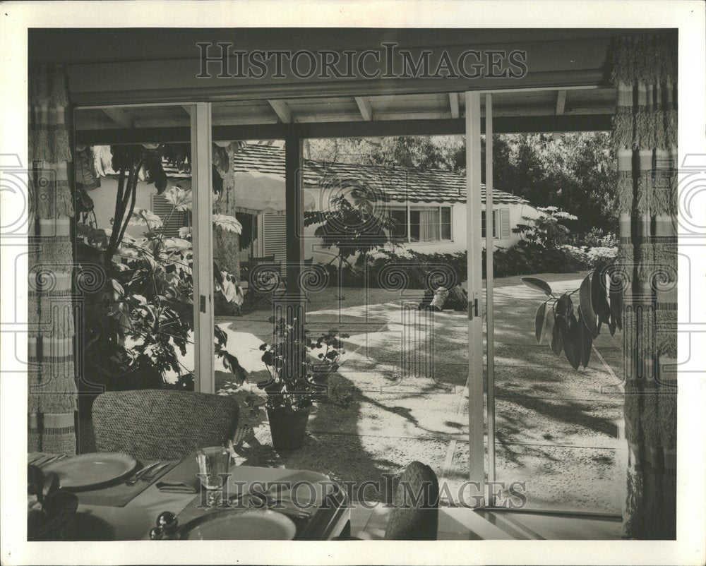 1960 dining room with great view of the gar - Historic Images