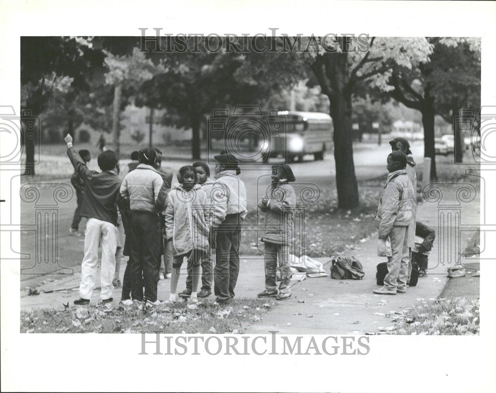 1983 Children wait for School Bus-Historic Images