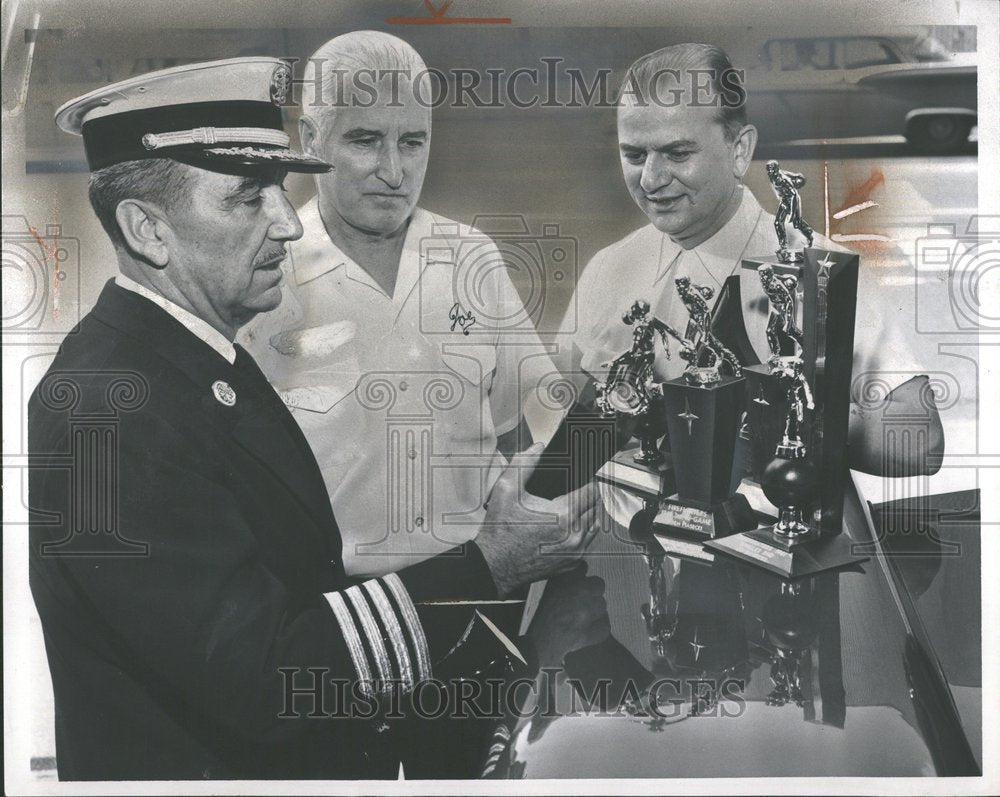 1961, Bowler Shows Off Trophies Fire Dept - RRV87989 - Historic Images