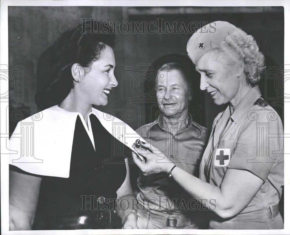 1952 Volunteer Receives Red Cross Button-Historic Images