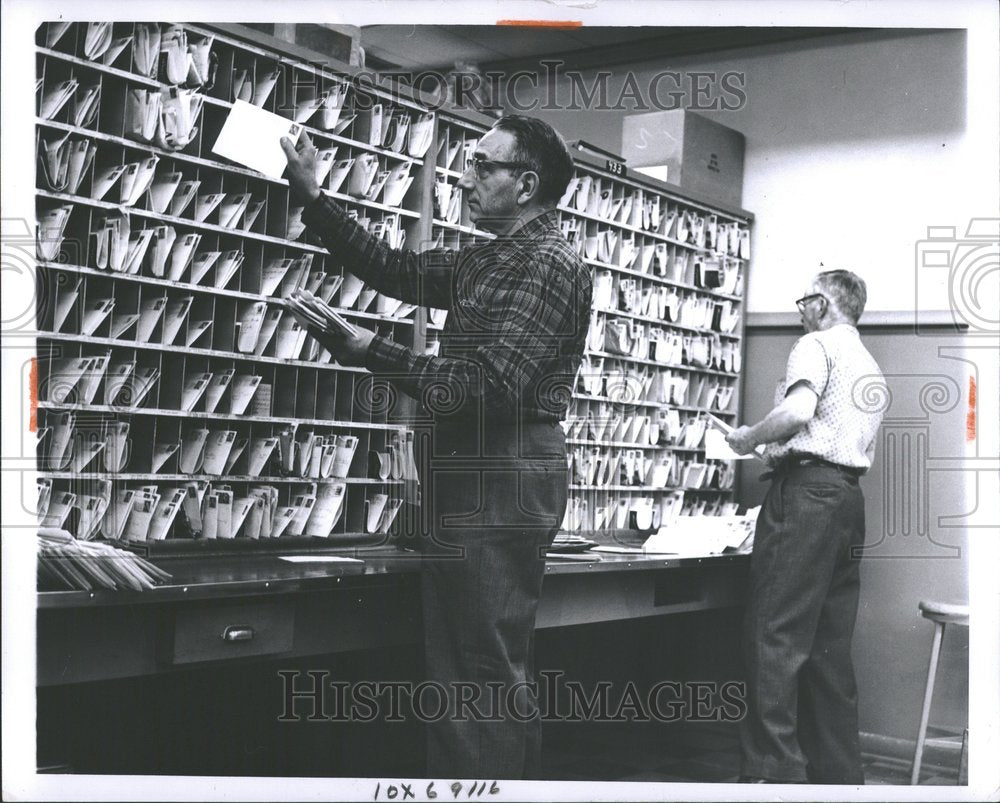 1963 U.S. Post Office Employees Sort Mail - Historic Images