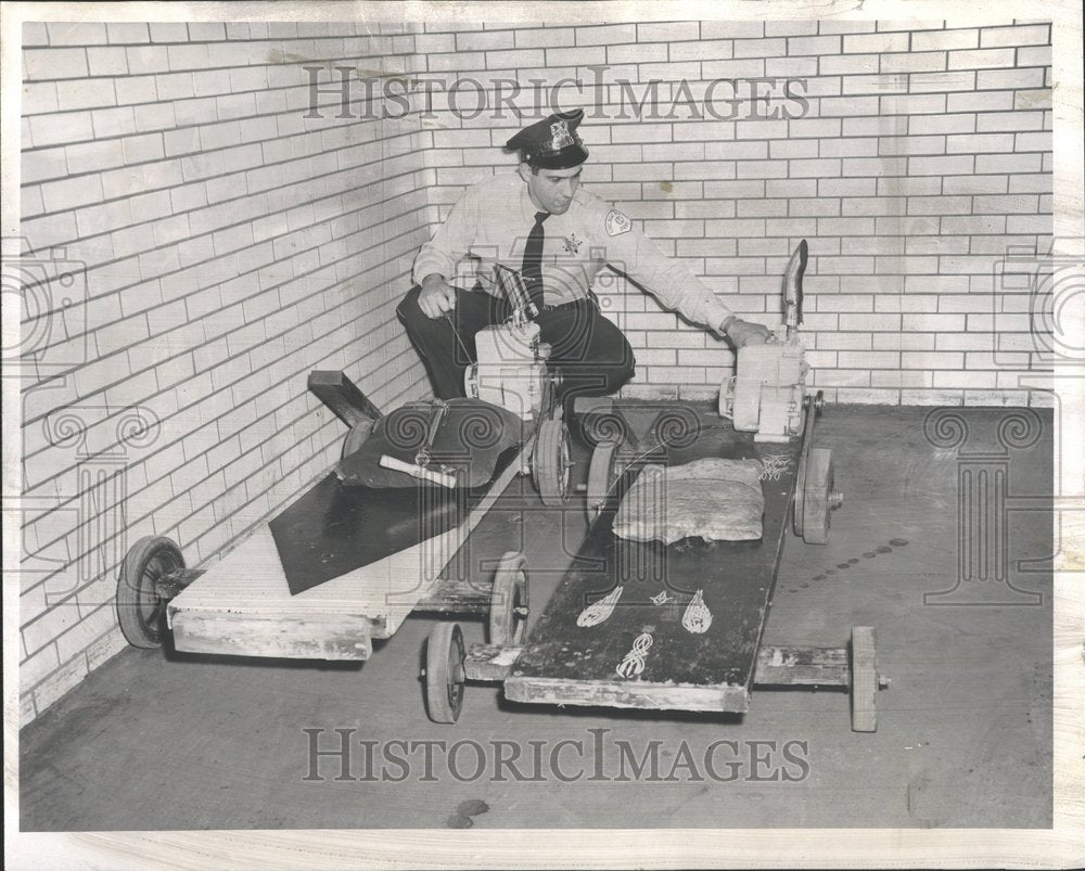 1957 Harry Ervanian Policeman chase scooter-Historic Images