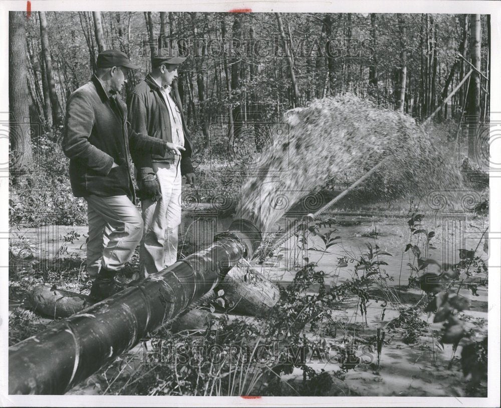 1954, Anthony David George stands field lake - RRV90887 - Historic Images