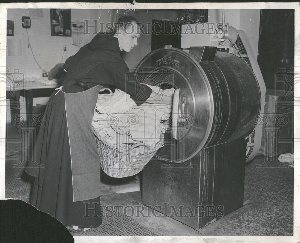 1955, Monk Story Bro Senemish Doing Laundry - RRV94353 - Historic Images