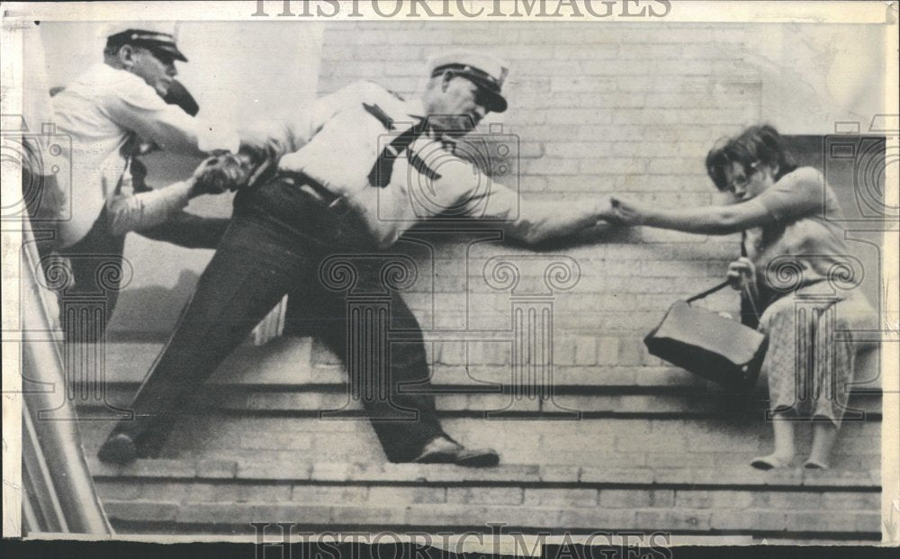 1963 Police Wood stretches Jean Teal perch-Historic Images