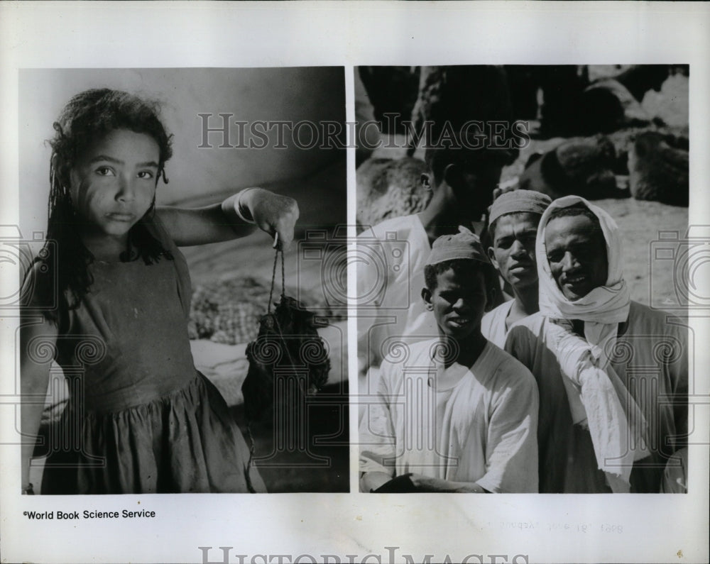 1968 Press Photo Beja Girl Men Water Scar Face - RRW03171 - Historic Images