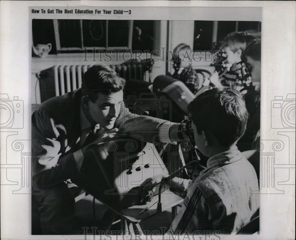 1959 Press Photo Physical cause reader sight hearing - RRW04587 - Historic Images