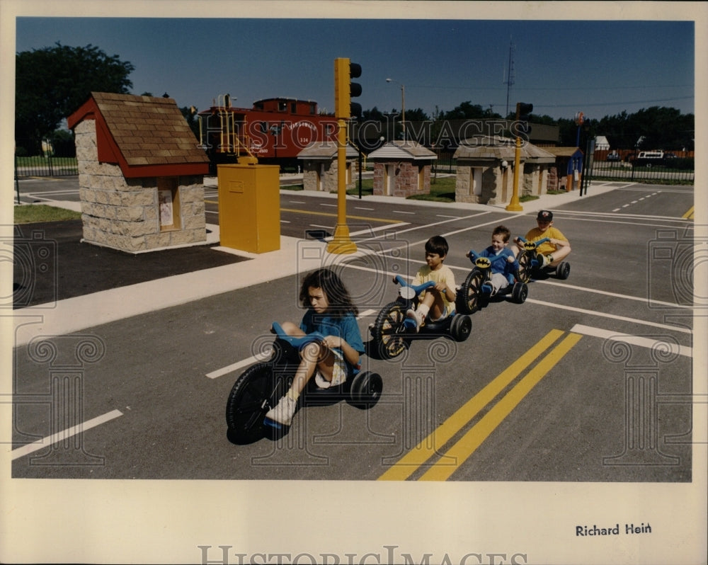 1990 Press Photo Big Wheels Lorena Munoz Traffic Town - RRW05203 - Historic Images