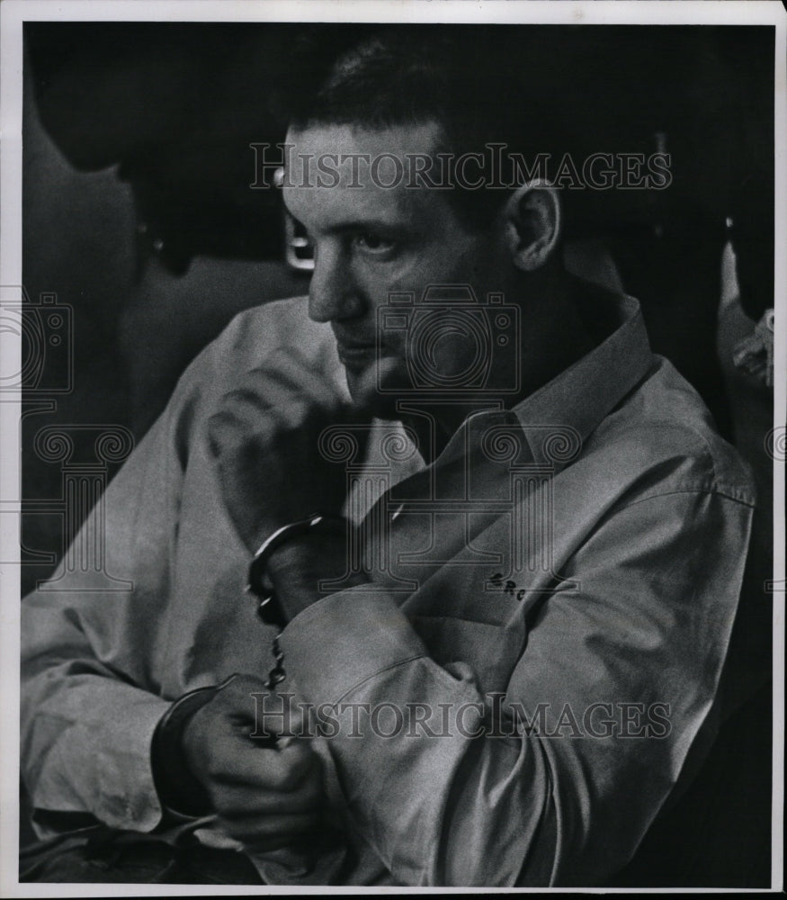 1964 Press Photo Albert Fournier in hand cuffs. - RRW09369 - Historic Images