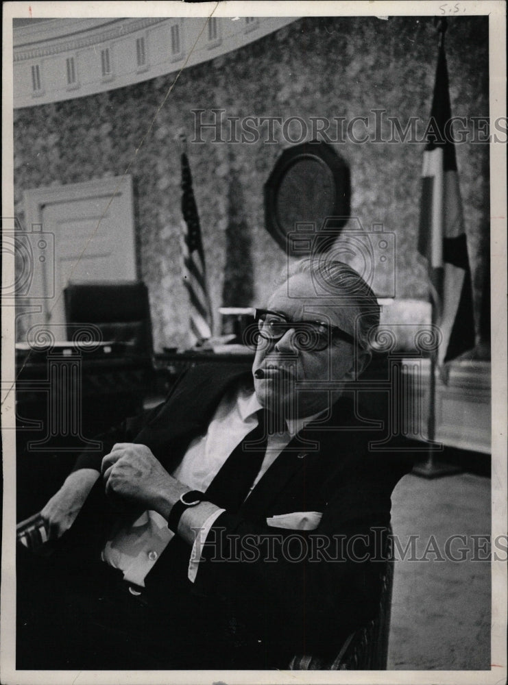 1969 Press Photo Bill McNichols Mulls politician sits - RRW12805 - Historic Images