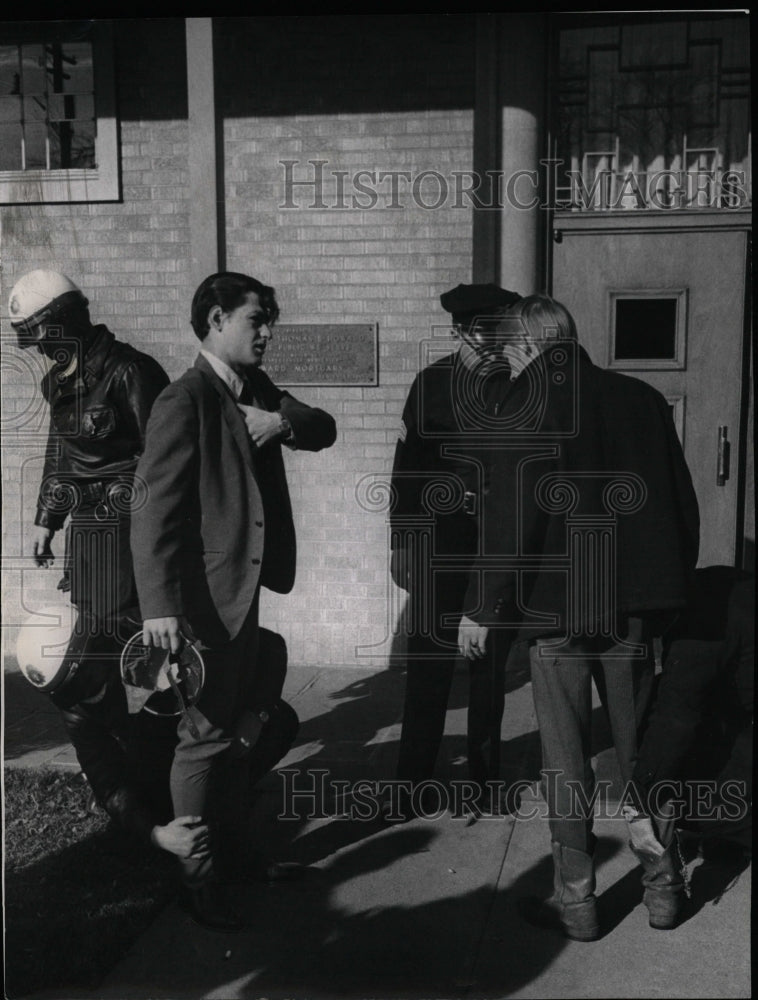 1968 Press Photo Two Young Men Arrested During Service - RRW17311 - Historic Images