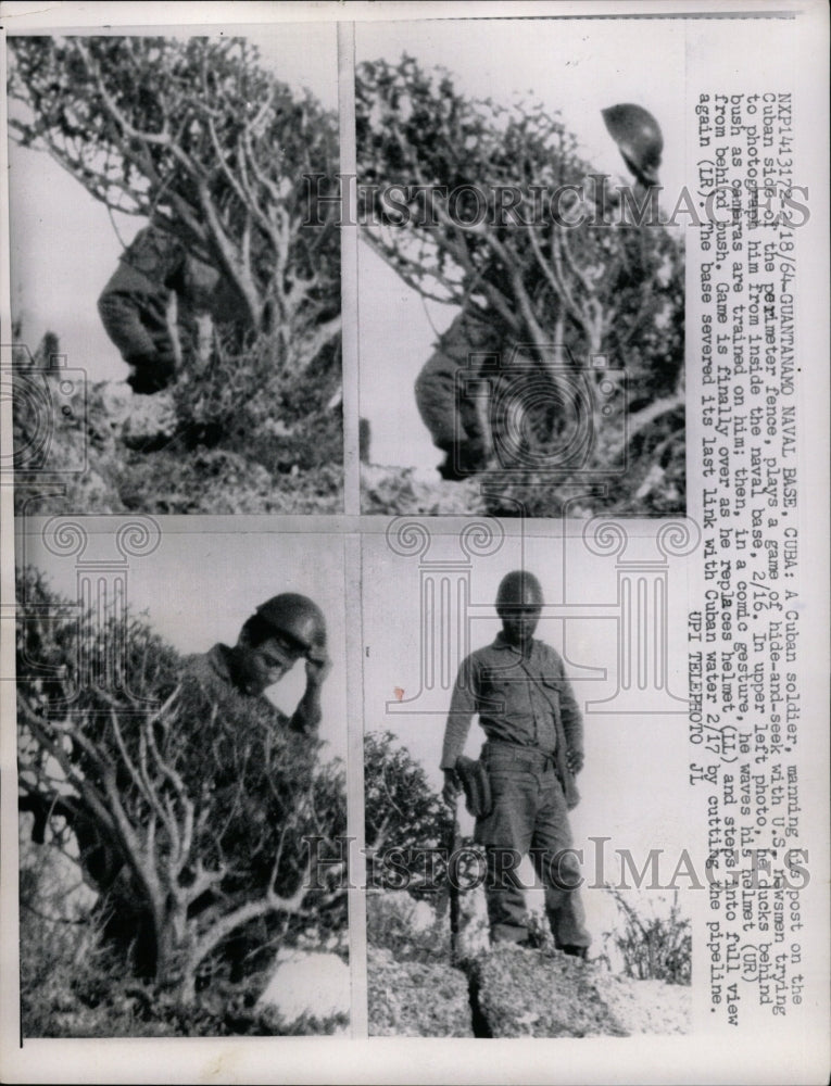 1964 Press Photo Cuban Soldier US Newsman game helmet - RRW22095 - Historic Images