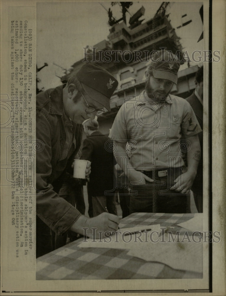 1972 Press Photo Connie Men Constellation Sailors sign - RRW22401 - Historic Images