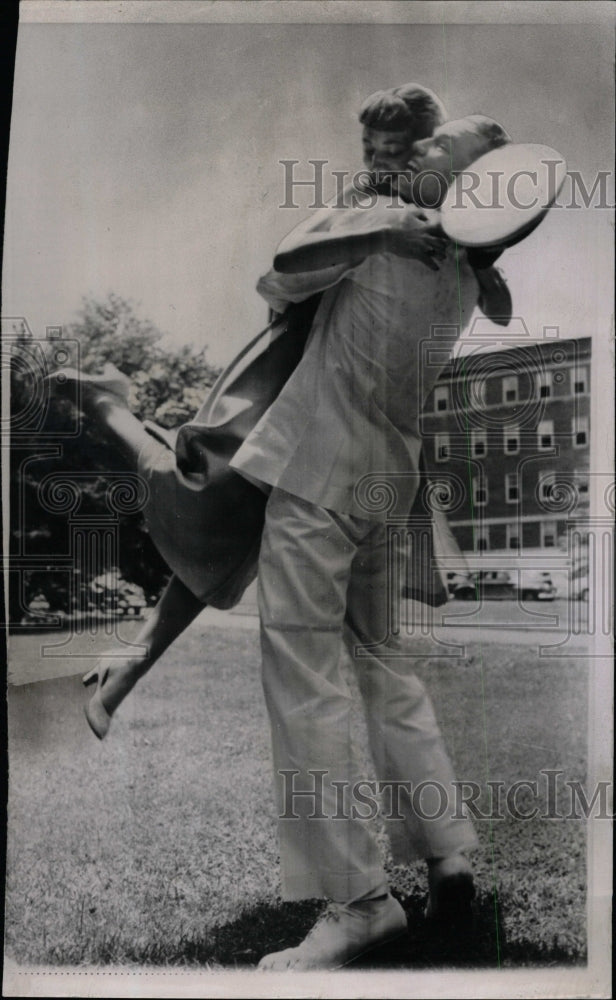 Press Photo Emsign John Brainard swings Joan Mati - RRW23193 - Historic Images