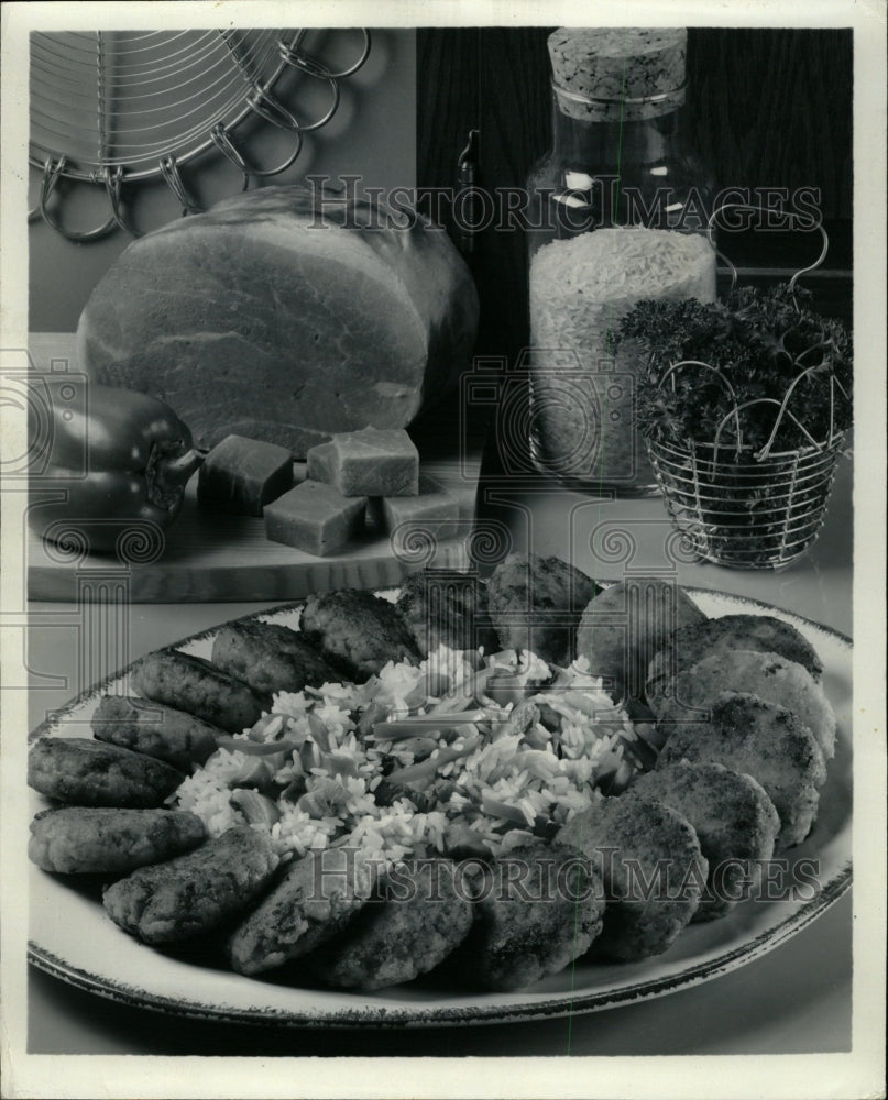 1981 Press Photo Ham patty rice platter costs food - RRW23237 - Historic Images