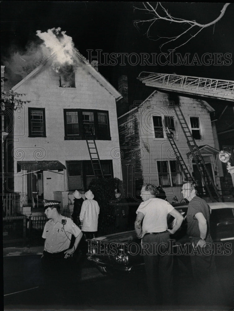 1970 Press Photo Flames Two Story Frame House Fireman - RRW23543 - Historic Images