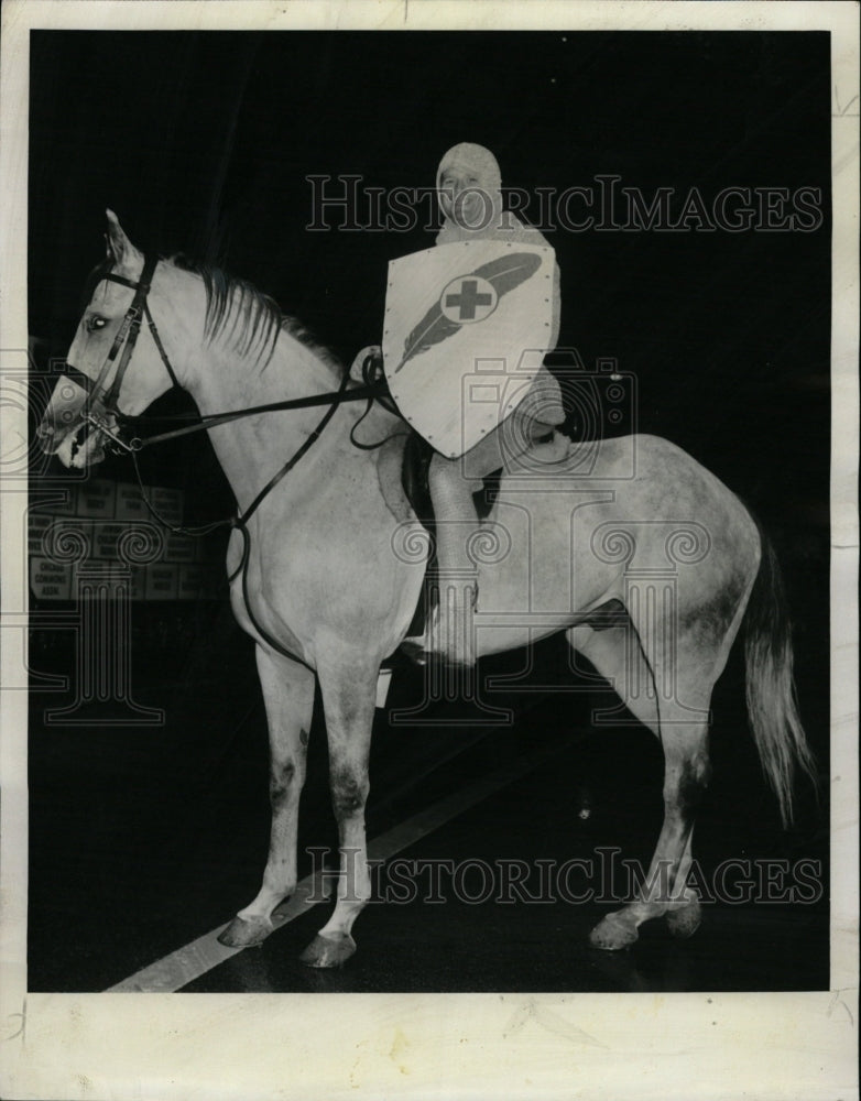 1959 Press Photo Dressed crusader Roger Bryan Rides - RRW24499 - Historic Images