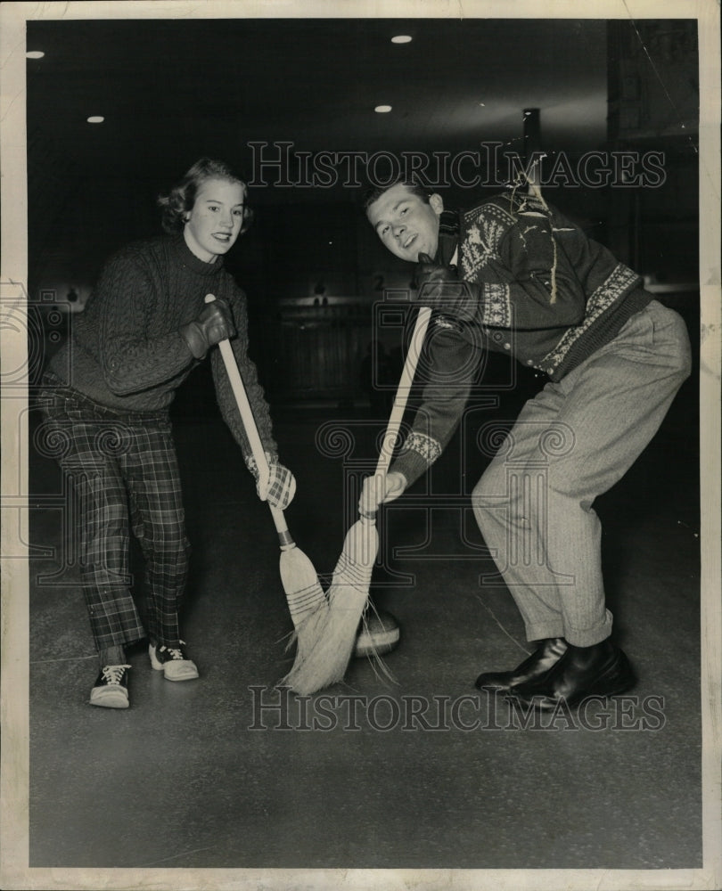 1956 Press Photo Shelly Martin Dave Doolittle sweeping - RRW24543 - Historic Images
