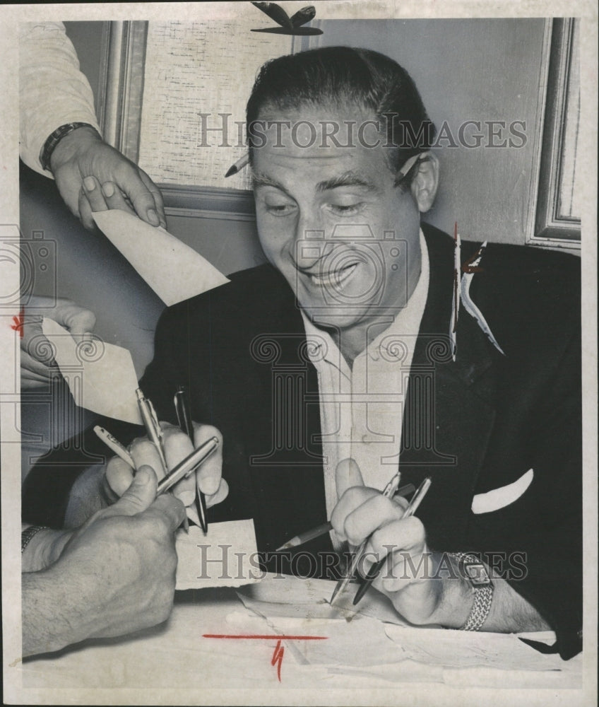 1960 Press Photo Sid Caesar autographing Comedian - RRW33163 - Historic Images