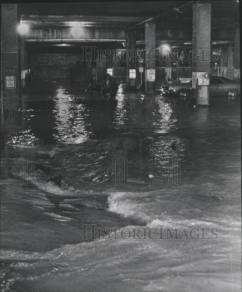 1970 Press Photo Firemen wade through flood water main - RRW34833 - Historic Images