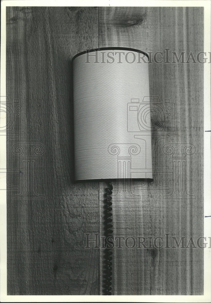 1981 Press Photo The perforated metal wall light. - RRW35925 - Historic Images