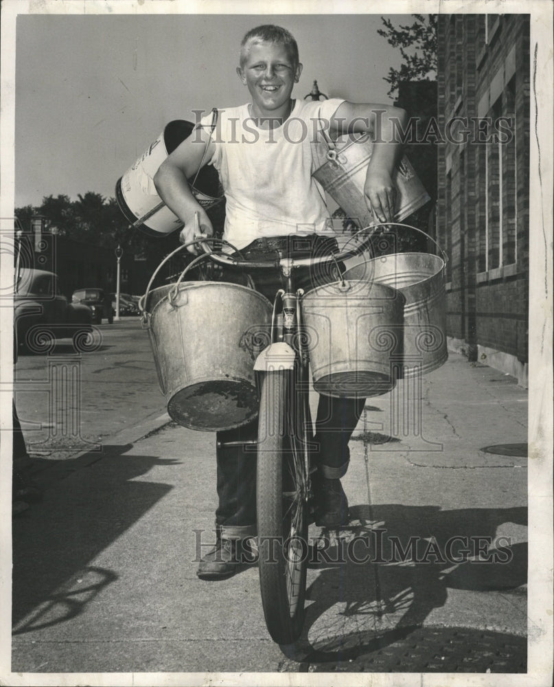 1953 Press Photo Ben Witt Fills Water Bucket Fire House - RRW38667 - Historic Images