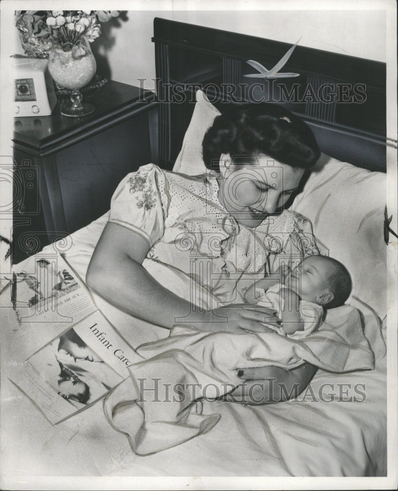 1951 Press Photo Mother take caring Child McGraw Women - RRW42451 - Historic Images