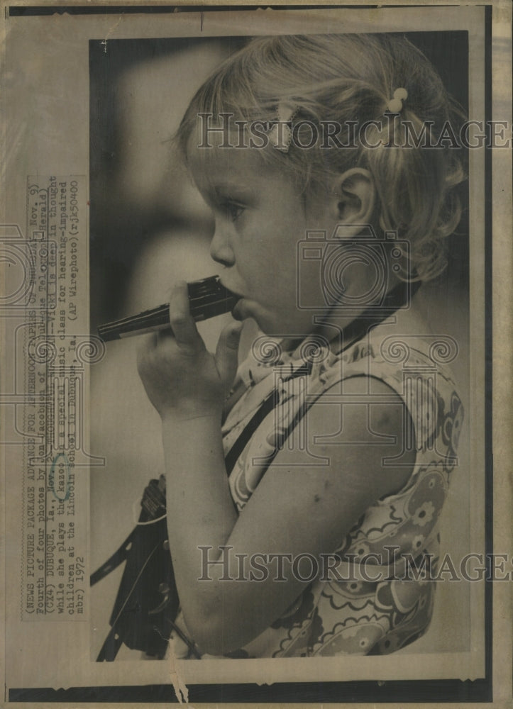 1982 Press Photo Hearing-impaired Vicki Plays Kazoo - RRW43715 - Historic Images