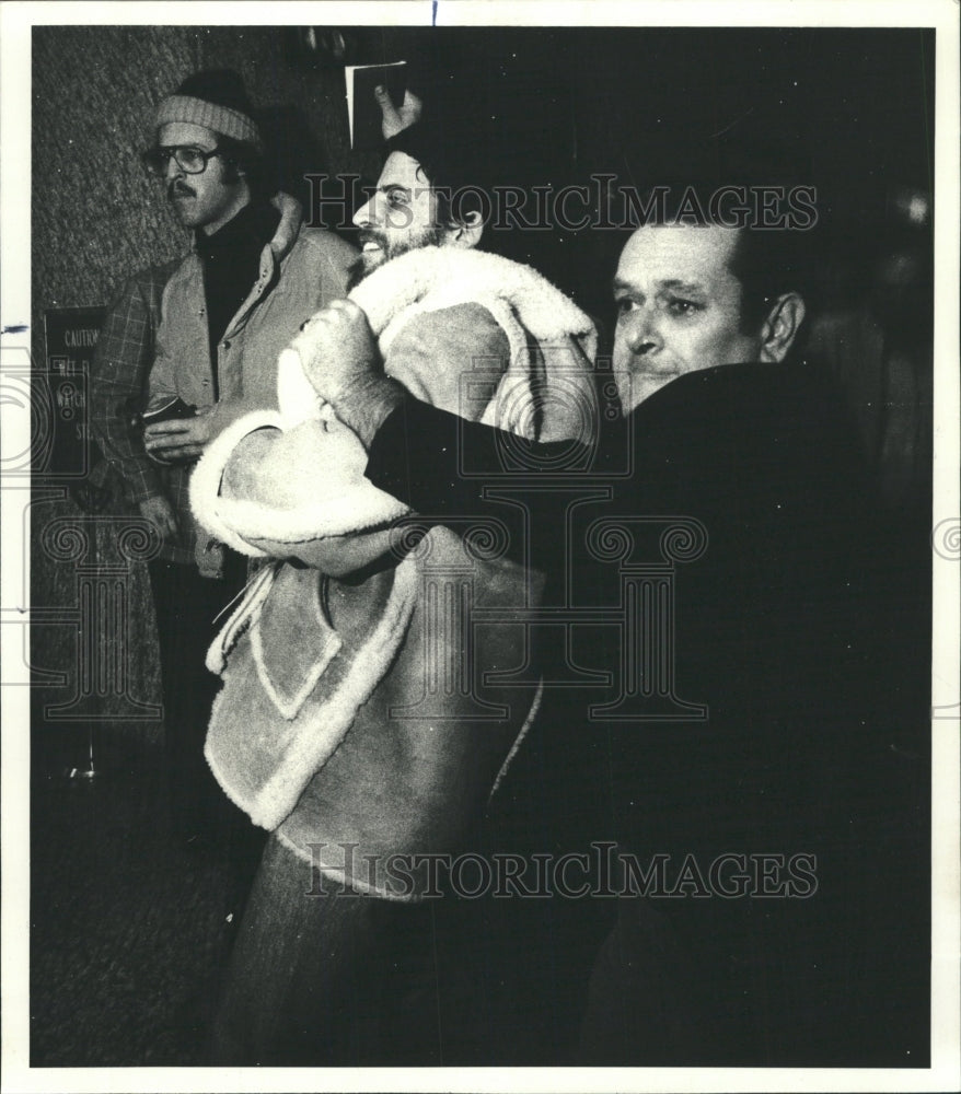 1979 Press Photo Pro-Mao Anti-Teng Protester Thrown Out - RRW46789 - Historic Images