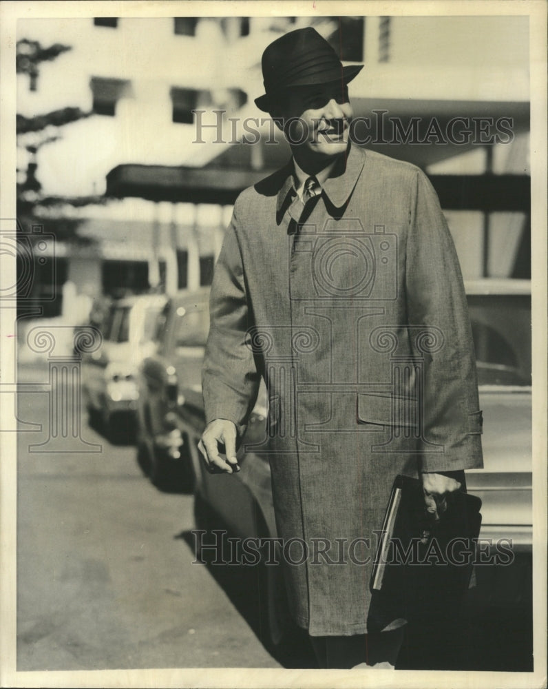 1964 Press Photo Rain Coat Black White Tickwave Weather - RRW47935 - Historic Images