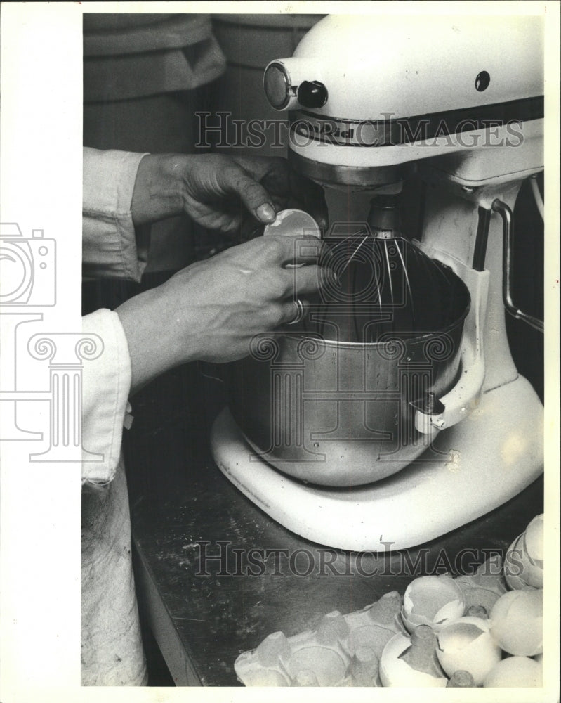 1981 Press Photo Eggs Being Beaten For Chocolate Cake - RRW49047 - Historic Images