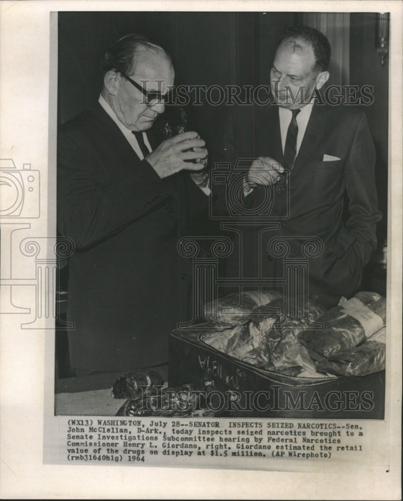 1964 Press Photo Sen John McClellan inspects seized - RRW49411 - Historic Images