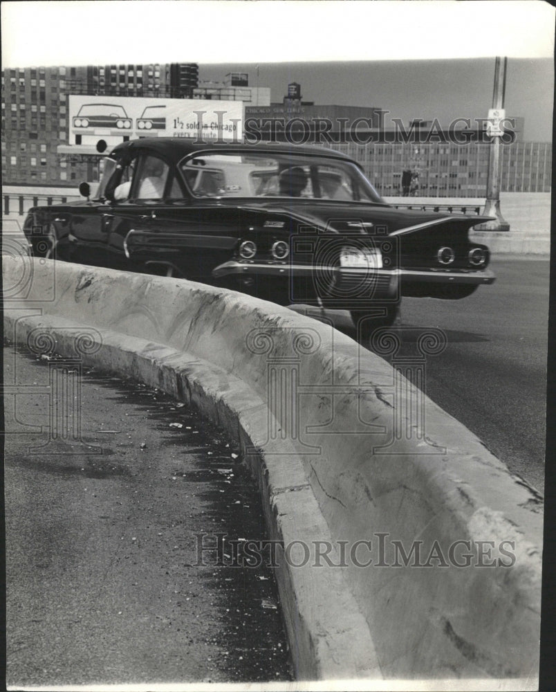 1965 Press Photo Chips Gouge Mark Attest Accidents Road - RRW50919 - Historic Images