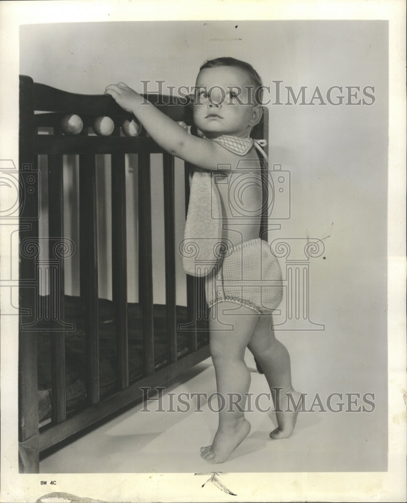 1958 Press Photo baby pose gingham terry cloth clothes - RRW51343 - Historic Images